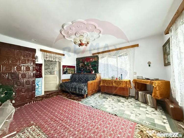 Casă cu 4 camere cu Teren 694 Mp în Central