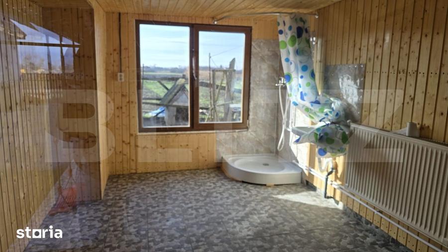 Casă cu 2 camere cu Teren 1000 Mp în Apa
