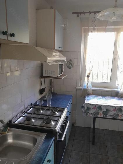 Apartament cu 2 camere semidecomandat în Podu Roș