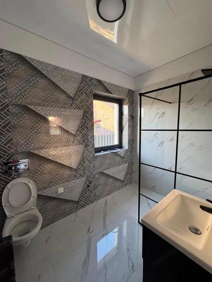 Apartament cu 4 camere decomandat în Bascov