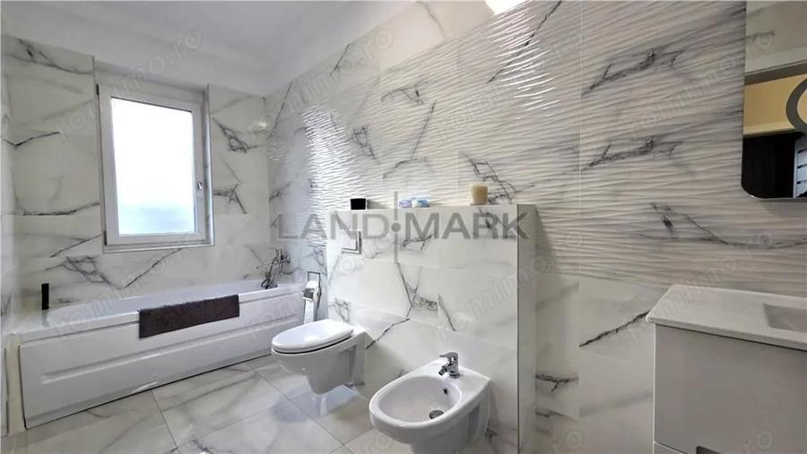 Casă cu Teren 640 Mp în Central