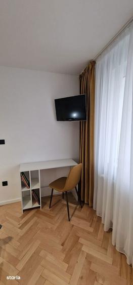 Apartament cu 2 camere semidecomandat, mobilat în Centrul Civic