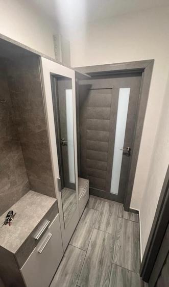 Apartament cu 2 camere semidecomandat, mobilat în Central