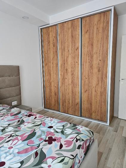 Ofer spre închiriere apartament două camere Cosmopolis  - 11