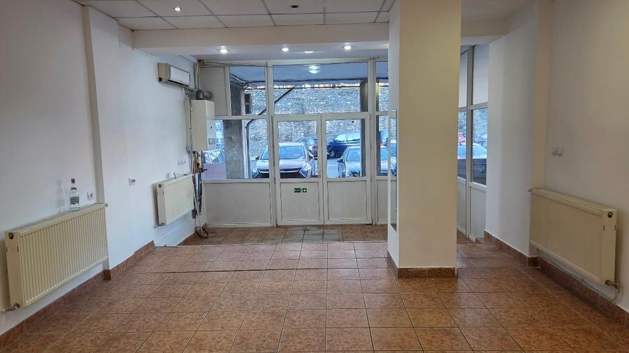 Inchiriez spatiu comercial,40 mp,Rm.Valcea,central,str.G-ral Magheru,langa BCR - 5