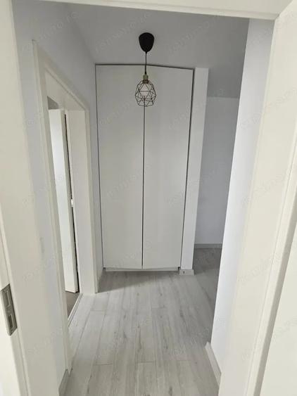 Apartament cu 2 camere semidecomandat, mobilat în Moșnița Nouă