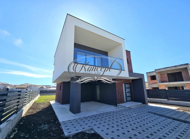 Locuinta moderna cu design cubic si curte plana in Dezmir - 2