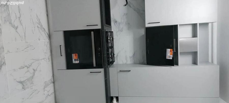 Garsonieră  complet mobilata si utilata, gradina si parcare proprie - 3