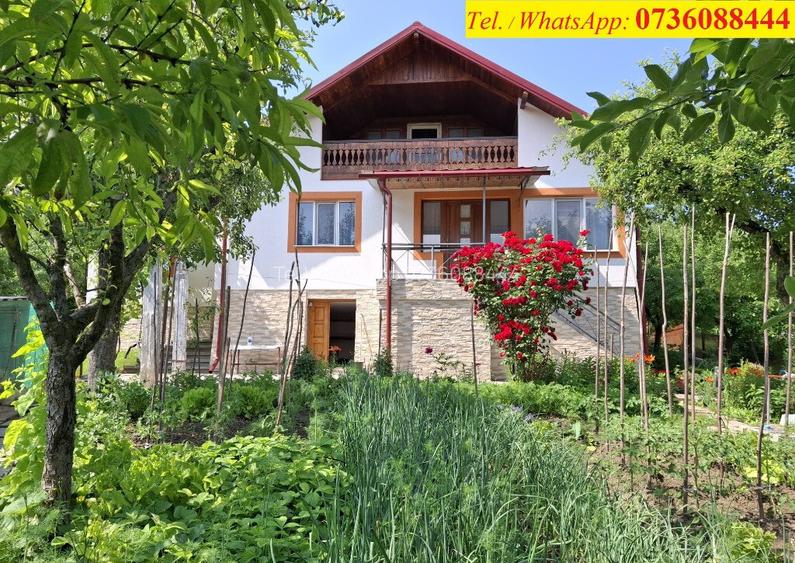 Casa 5 camere,util 112mp,beci,garaj,1200mp intravilan livada,Slanic