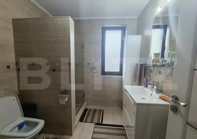 Casa cu 3 camere in suprafa?a de 122 mp ?i un teren de 5 - 11