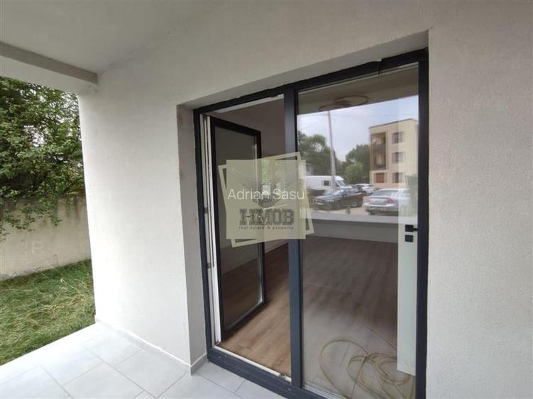 Apartament modern 2 camere 2 bai terasa acoperita si curte in Selimbar
