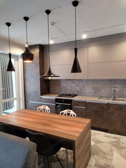 IN UNIRII de inchiriat apartament 2 camere - 5