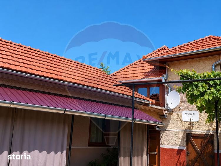 Casă cu 4 camere cu Teren 1150 Mp în Romos