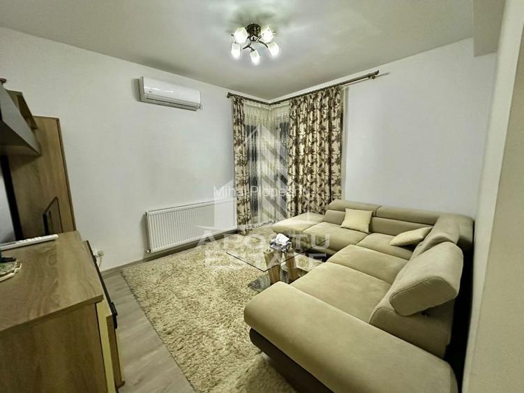 Apartament 2 camere, parter, decomandat,loc de parcare,Giroc