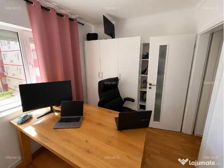 Apartament cu 4 camere semidecomandat în Tractorul