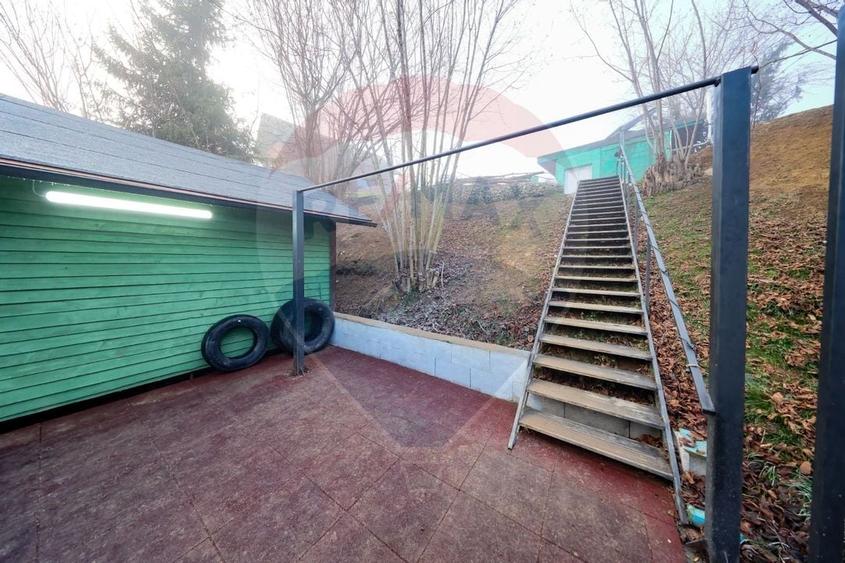 Ansamblu rezidențial cu casă principală și anexe, teren 1.487 mp - 18