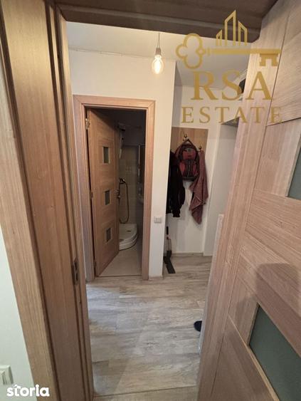 Garsoniera de vanzare etaj 1 zona Dovali Rm Valcea - 4