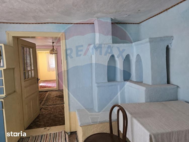 Casă cu 4 camere cu Teren 3686 Mp în Buciumi