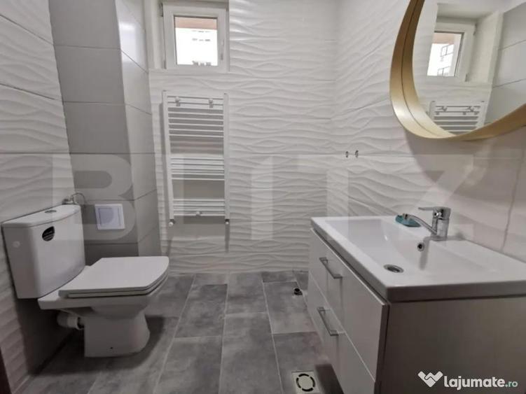 Apartament 2 camere ,loc de parcare + boxa , zona 9 mai - 2