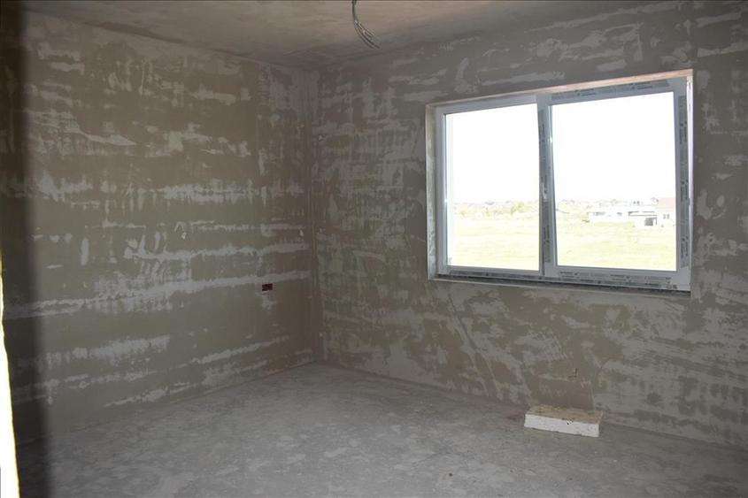 Casa individuala - garaj- finisaje premium - asfalt - toate utilitatile - 12