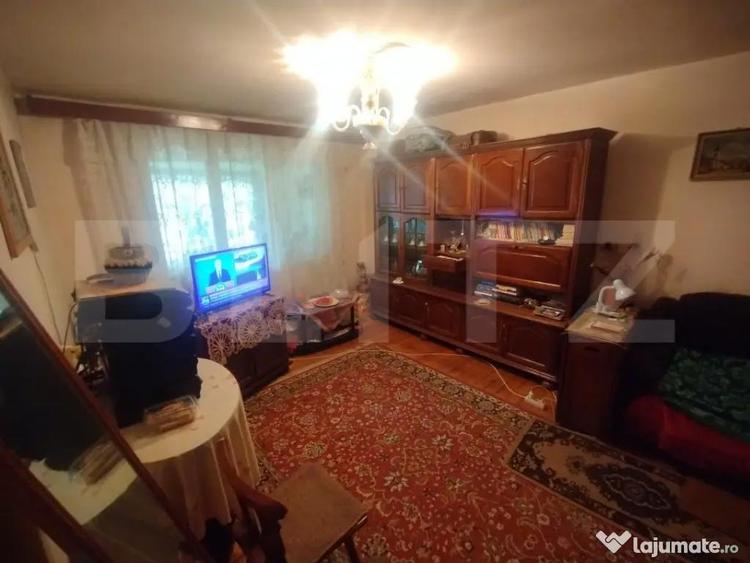 Apartament 3 camere,63mp,decomandat,parter inalt,zona noua,B - 4
