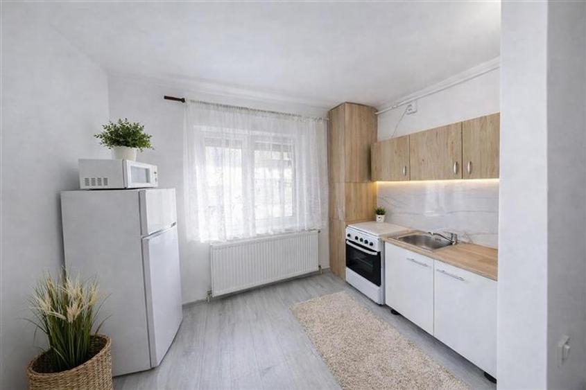 Garsoniera practica,Central: vis-a-vis de Universitatea Transilvania,Brasov. - 3