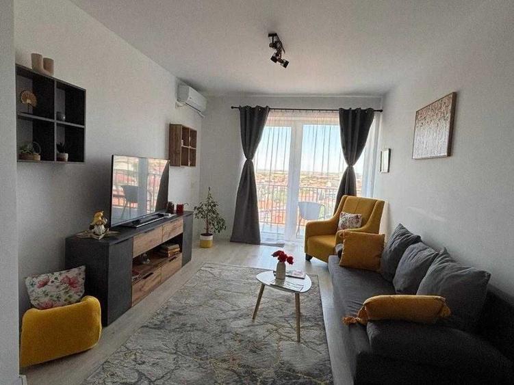 Apartament cochet de inchiriat, 2 camere, decomandat, complet mobilat si utilat, loc de parcare inclus - 1