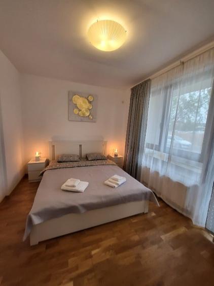 Apartament cu 2 camere semidecomandat, mobilat în Central
