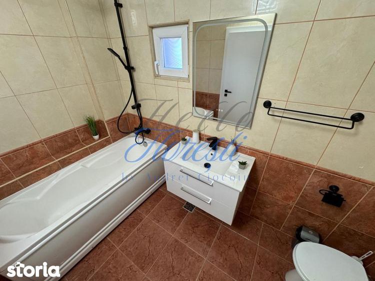 Apartament cu 4 camere semidecomandat, mobilat în Central