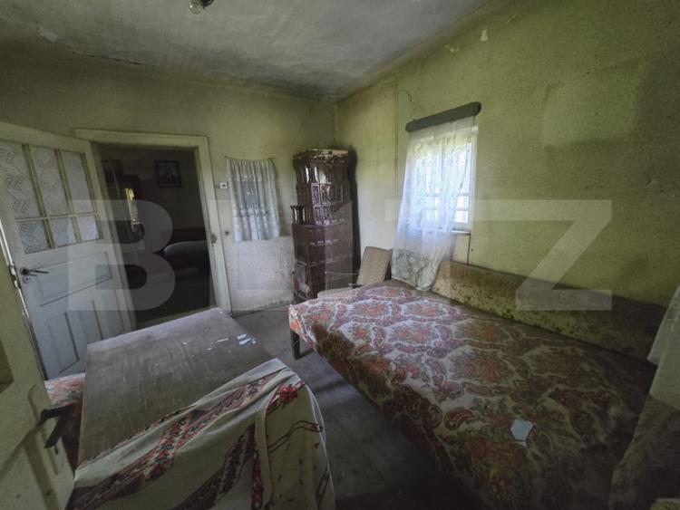 Casă cu 3 camere cu Teren 1954 Mp în Tomșani