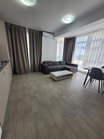 Apartament cu 3 camere semidecomandat, mobilat în Nord