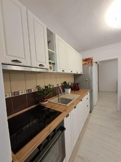 Apartament cu 3 camere decomandat în Ozana