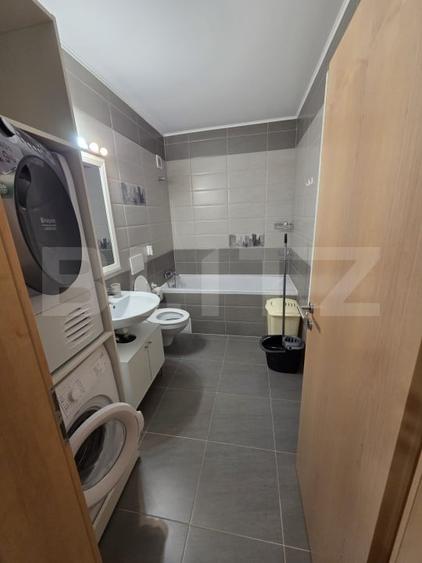 Apartament cu 2 camere decomandat, mobilat în Tractorul