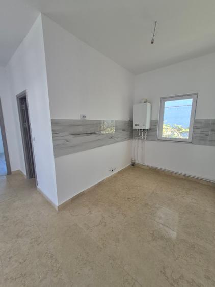 Casă individuală cu 4 camere cu Teren 200 Mp în Năvodari