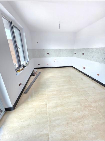 Casă cu 4 camere cu Teren 500 Mp în Central