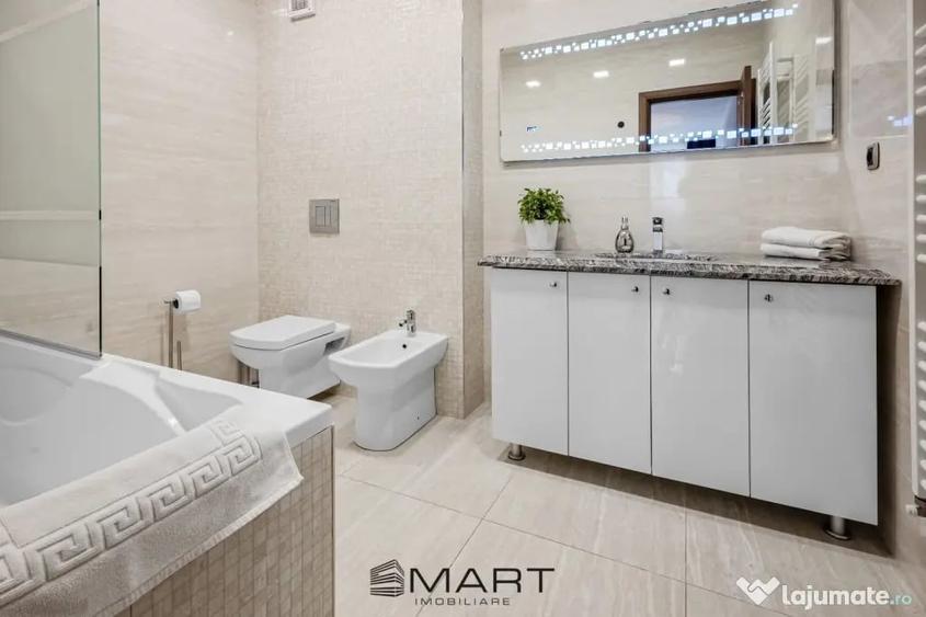 Apartament cu 4 camere decomandat în Tractorul