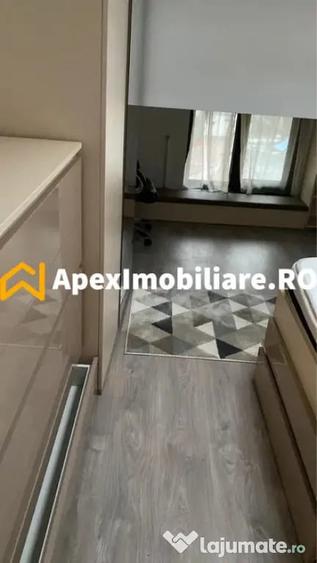 Apartament cu 3 camere semidecomandat în 1 Mai