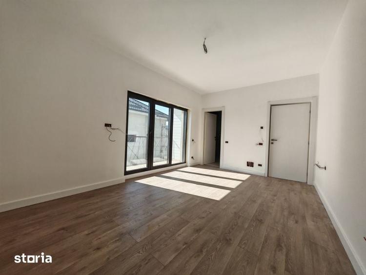 Casă cu 4 camere cu Teren 350 Mp în Tunari