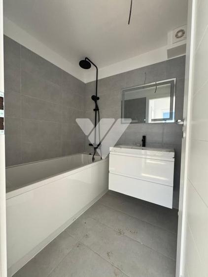 Apartament cu 3 camere decomandat în Șelimbăr — fotografia 3
