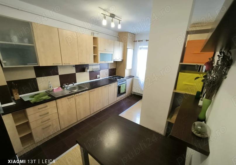 Apartament decomandat, mobilat, utilat, cu doua camera si loc de parcare in Racadau - 4