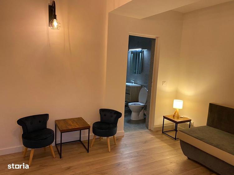 Garsoniera , et 2,str Victoriei ,in zona Pronto - 5