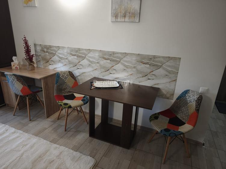 Sat vacanta - Garsoniera moderna in bloc nou + loc de parcare