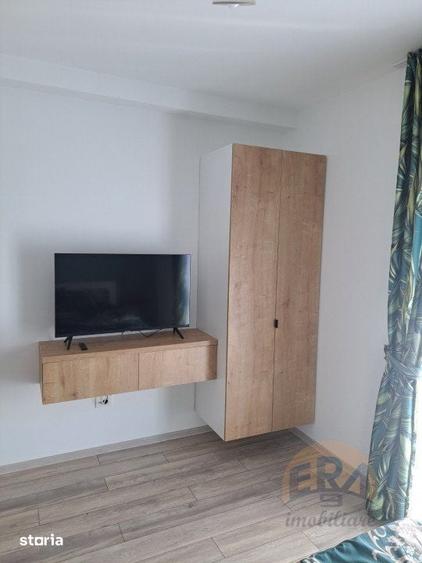 Apartament cu 2 camere decomandat în Rontău