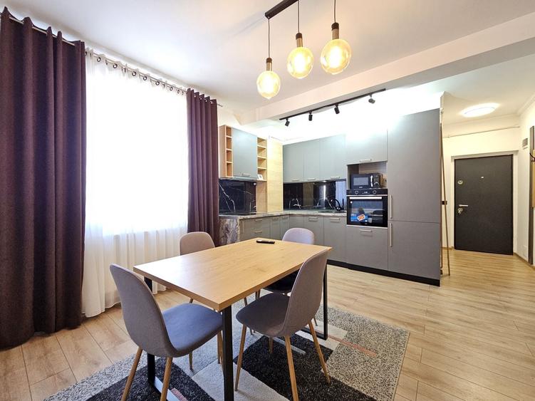 Apartament cu 2 camere semidecomandat, mobilat în Central