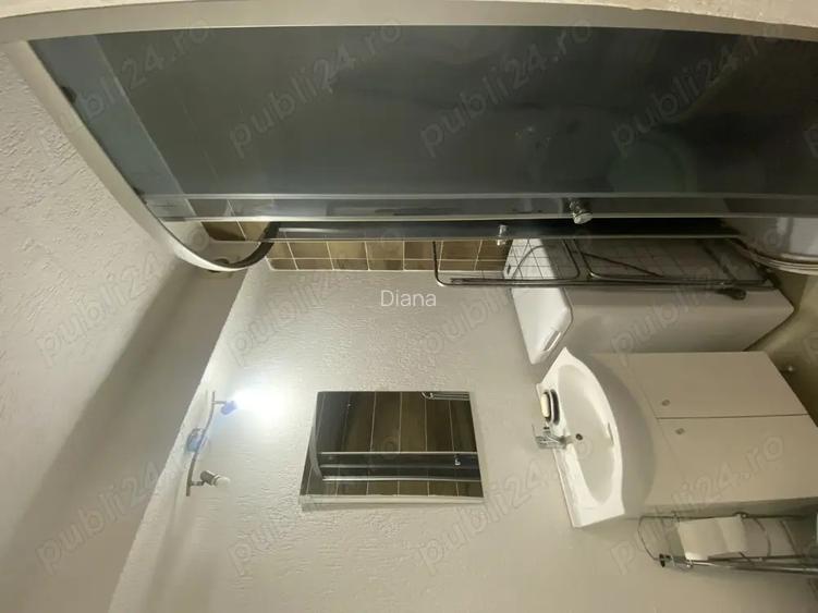 Vand garsoniera cu centrala proprie