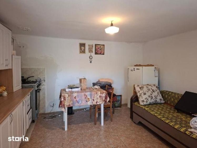 Casă cu 2 camere decomandat cu Teren 1150 Mp în Slimnic