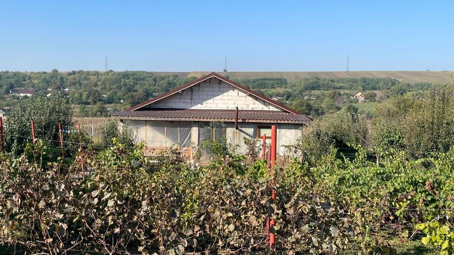 Casă cu 4 camere cu Teren 900 Mp în Holboca