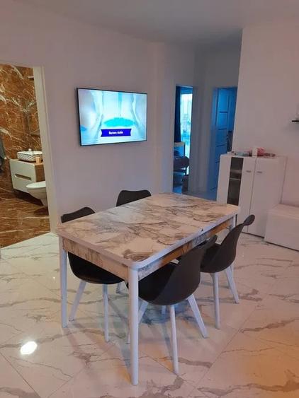 Apartament cu 3 camere semidecomandat, mobilat în Florești — fotografia 2