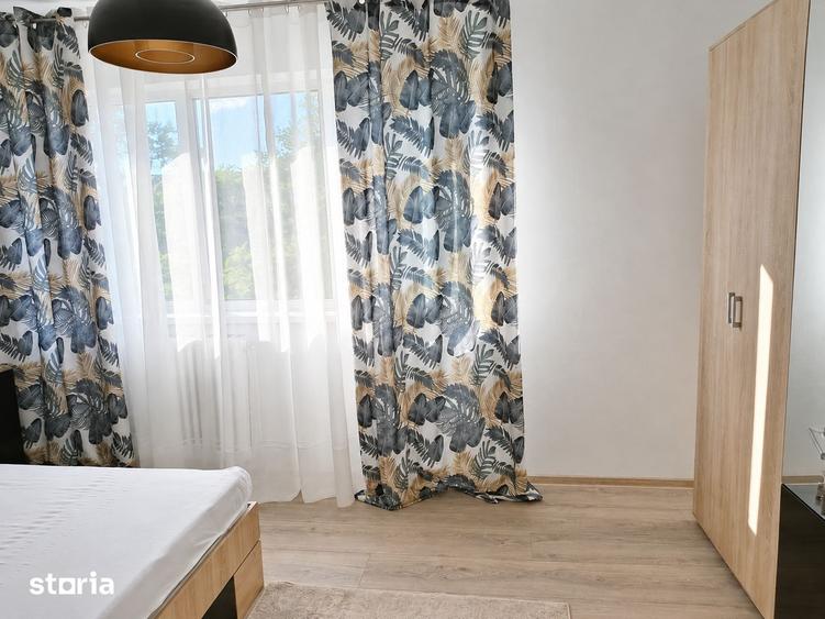 Apartament cu 2 camere semidecomandat, mobilat în Podu Roș
