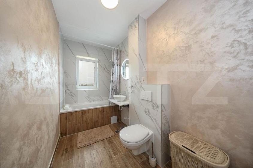 Apartament cu 3 camere decomandat în Tractorul